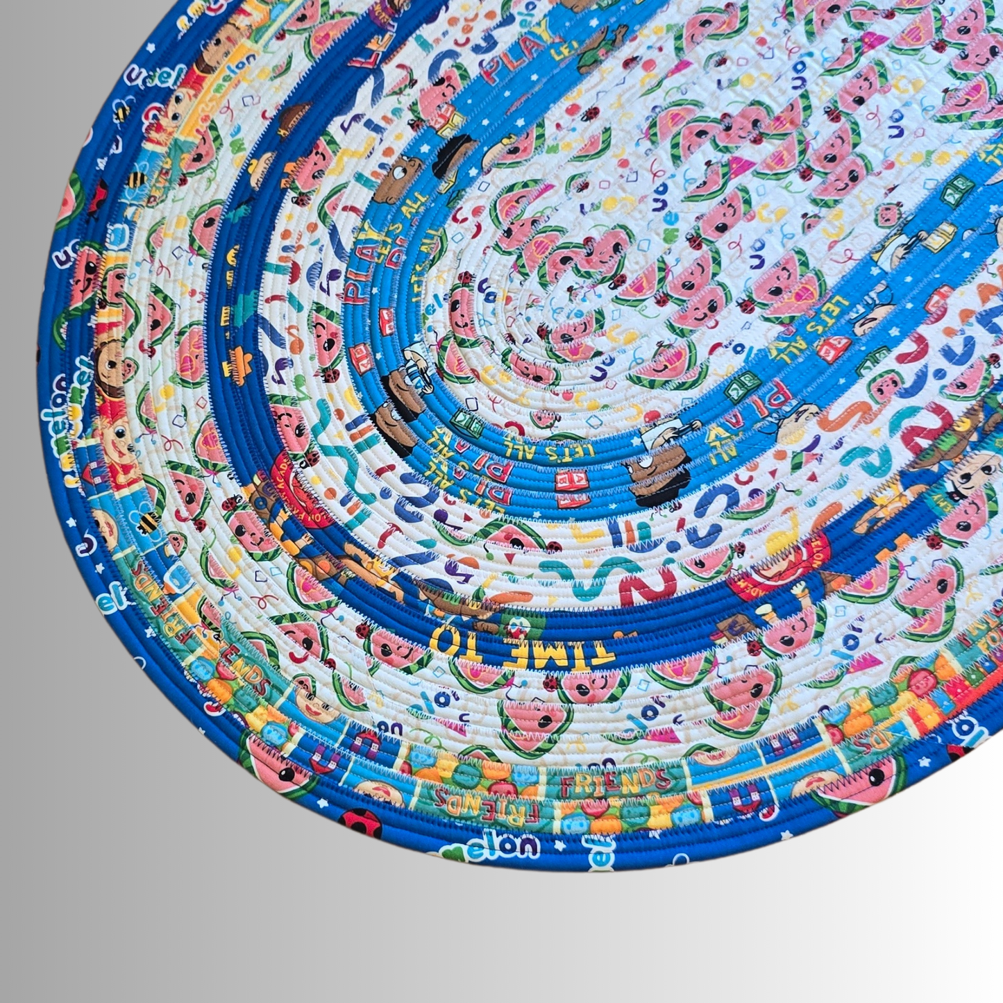 Cocomelon Handmade Oval Jelly Roll Rug in Blue