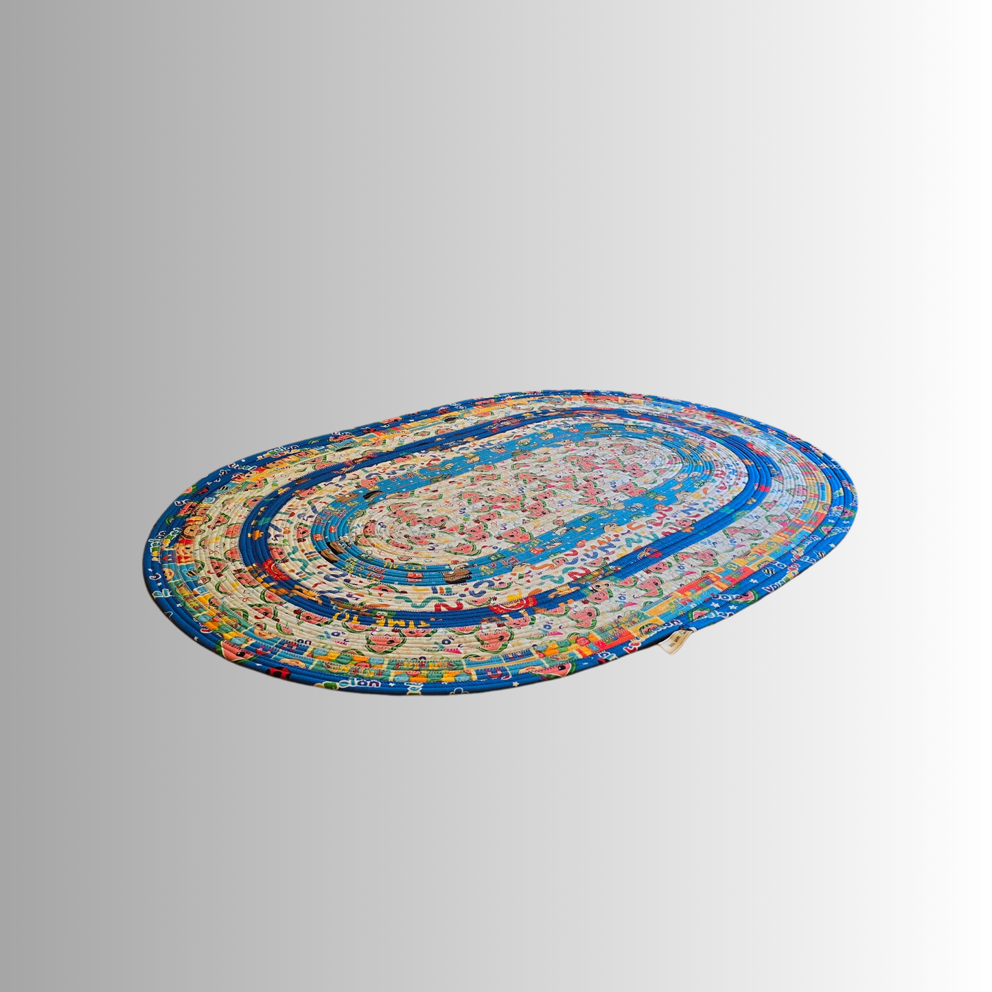 Cocomelon Handmade Oval Jelly Roll Rug in Blue