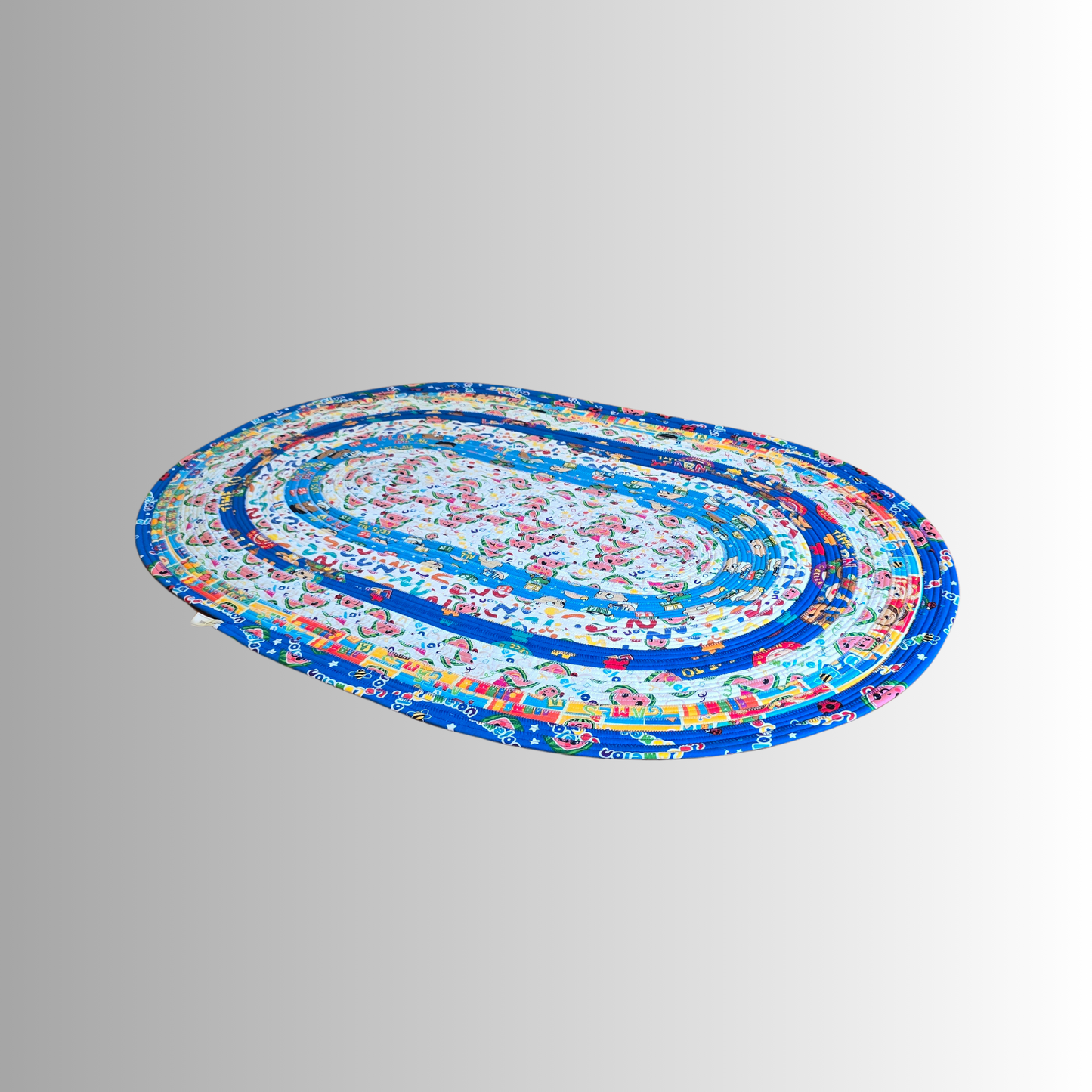 Cocomelon Handmade Oval Jelly Roll Rug in Blue