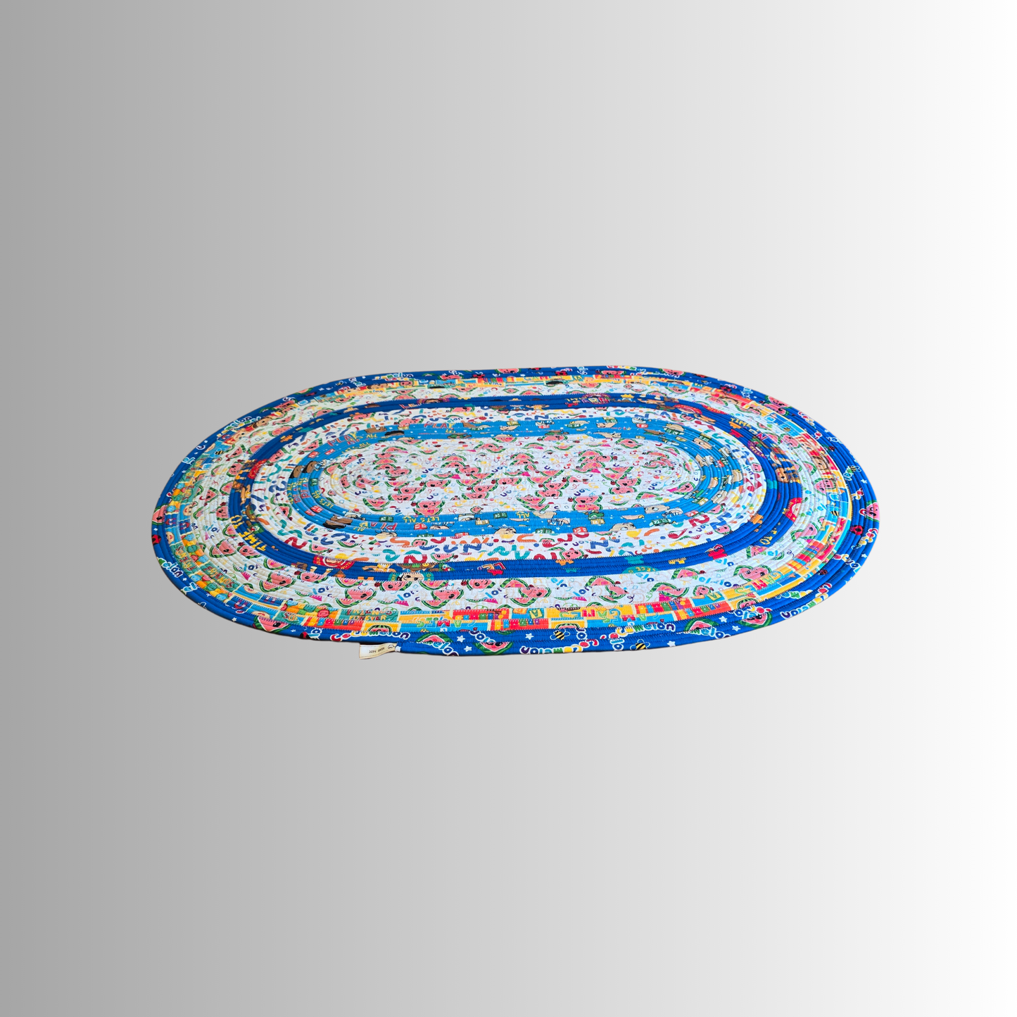 Cocomelon Handmade Oval Jelly Roll Rug in Blue