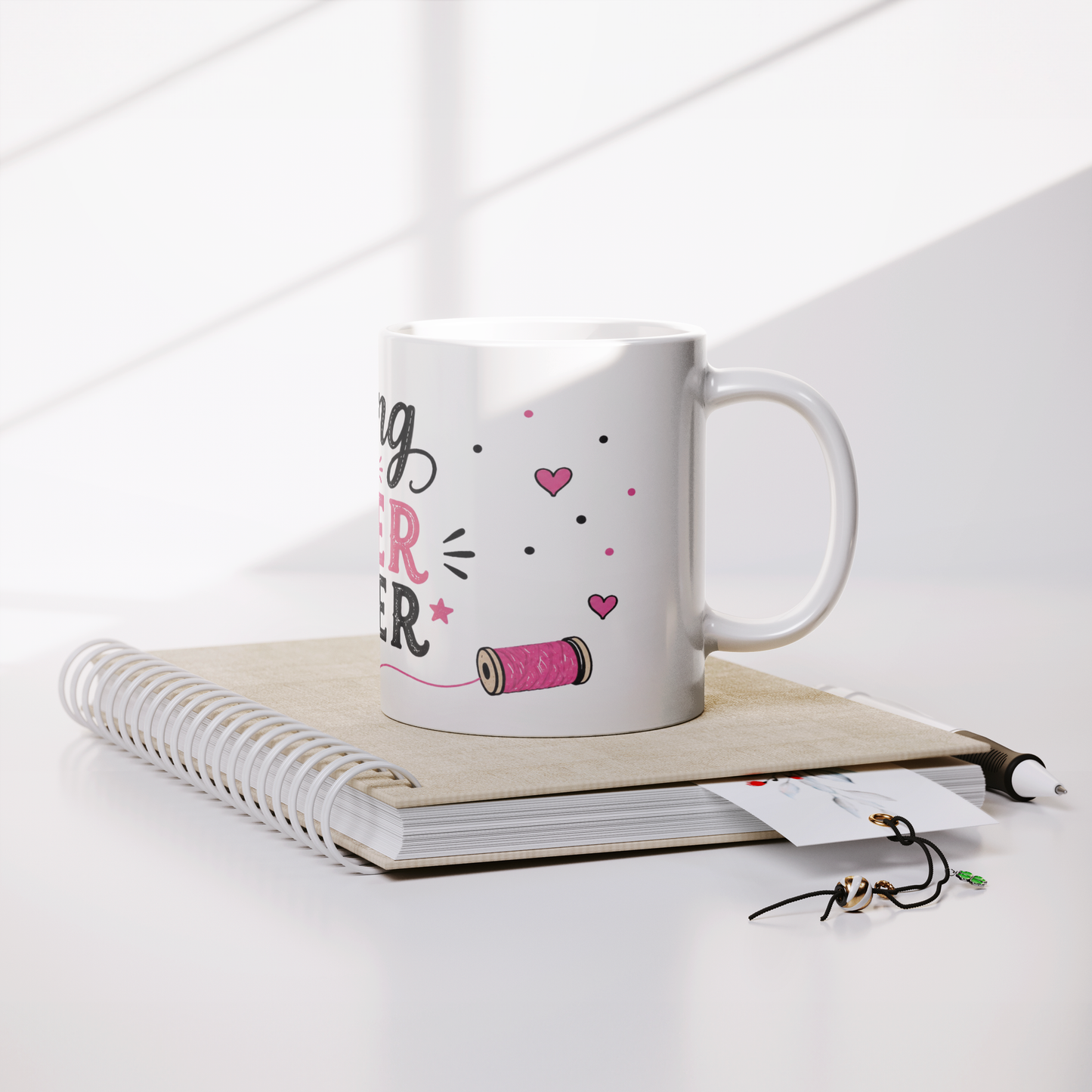 Sewing_is_My_Super_Power_11oz_Swag_Coffe_Lifestyle_Notebook_Mockup.png_15979089